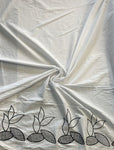 Off white cotton lace with black embroidered floral border