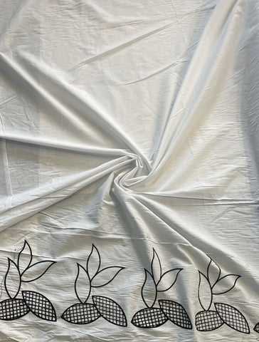 Off white cotton lace with black embroidered floral border