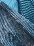 Metallic liquid micro pleated brocade