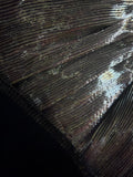 Metallic liquid micro pleated brocade