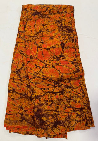 Brown and orange crack tie and dye African print cotton