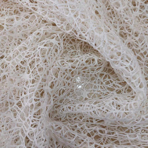 Of white spider net lace