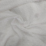 Off white textured brocade