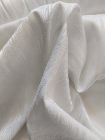 Stretchy off white striped satin