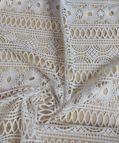 White oval floral cord lace