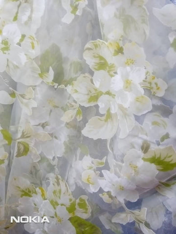 Green and white floral organza